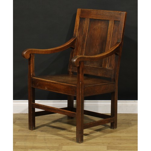 1314 - A 17th century style oak panel back armchair, scroll arms, square legs, 96cm high, 57cm wide, the se... 