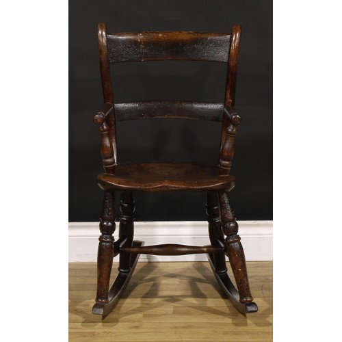 1866 - A Victorian vernacular beech and elm child’s bar-back chair, later converted to a rocking chair, 75.... 