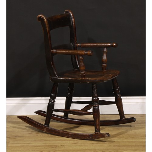 1866 - A Victorian vernacular beech and elm child’s bar-back chair, later converted to a rocking chair, 75.... 