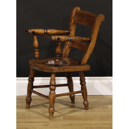 1435 - A Victorian child’s smoker’s bow form high chair, saddle seat with covered latrine hole, 76.5cm high... 