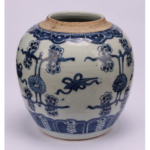 222 - A Chinese porcelain ginger jar, painted in tones of underglaze blue with lotus blooms and characters... 