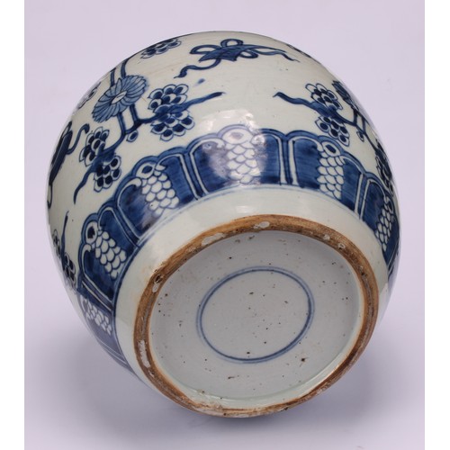 222 - A Chinese porcelain ginger jar, painted in tones of underglaze blue with lotus blooms and characters... 