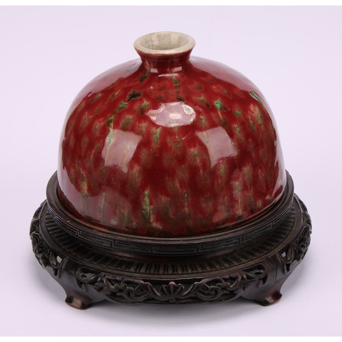 226 - A Chinese taibai zun water pot, mottled tones of red and green glaze, hardwood stand, 15cm high over... 