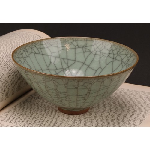 218 - A Chinese Ge ware type bowl, spreading circular form in green glaze, 8cm high, 18cm diameter, 20th c... 