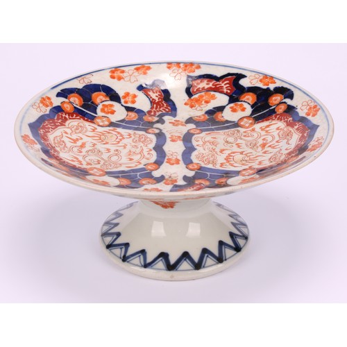 231 - A Japanese dessert service, decorated in the Imari palette with dragons, flowers and traditional mot... 