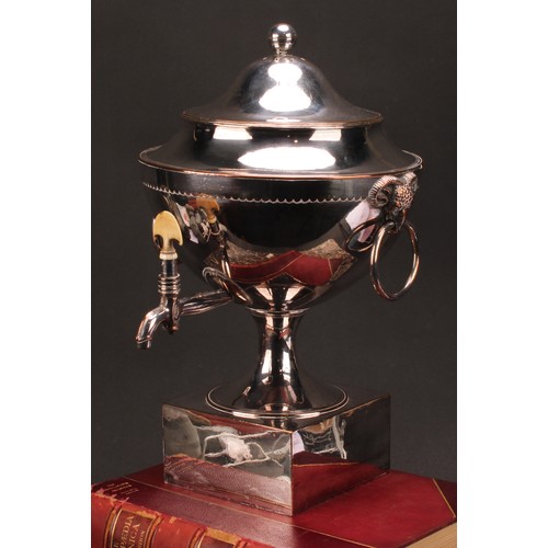 557 - A Post-Regency silver plated pedestal samovar, domed cover, ball finial, ram's mask loop handles, ou... 