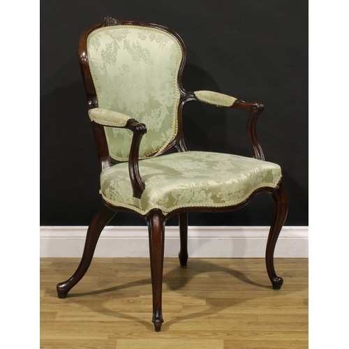 1382 - A 19th century French Hepplewhite design mahogany elbow chair, arched cresting carved with a flower ... 