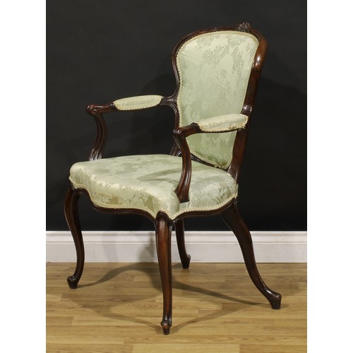 1382 - A 19th century French Hepplewhite design mahogany elbow chair, arched cresting carved with a flower ... 