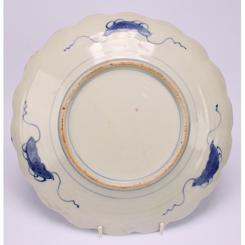 241 - A Japanese shaped circular dish, decorated in the Imari palette, 28.5cm diameter, Meiji period; anot... 