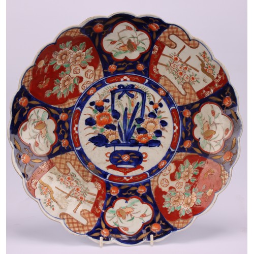 240 - A Japanese shaped circular charger, decorated in the Imari palette, 35.5cm diameter, Meiji period