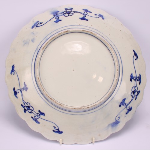 240 - A Japanese shaped circular charger, decorated in the Imari palette, 35.5cm diameter, Meiji period