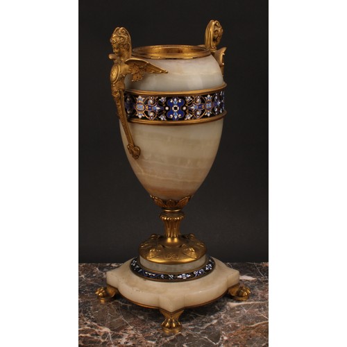 1243 - A pair of late 19th century French gilt bronze and champlevé enamel mounted onyx ovoid urns, the han... 