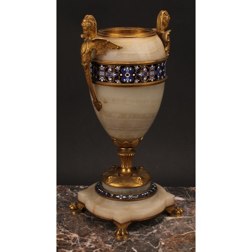 1243 - A pair of late 19th century French gilt bronze and champlevé enamel mounted onyx ovoid urns, the han... 