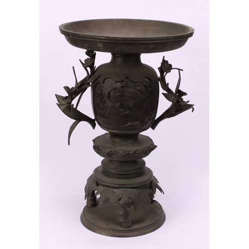 255 - A pair of Japanese bronze usebata or ikebana vases, each cast with birds amongst flora, leafy bamboo... 