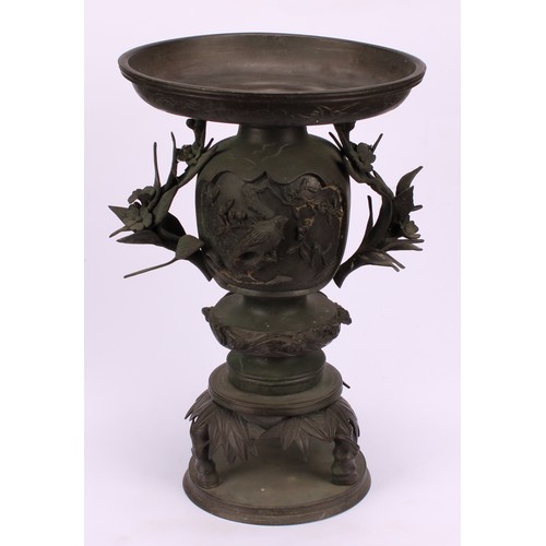 255 - A pair of Japanese bronze usebata or ikebana vases, each cast with birds amongst flora, leafy bamboo... 