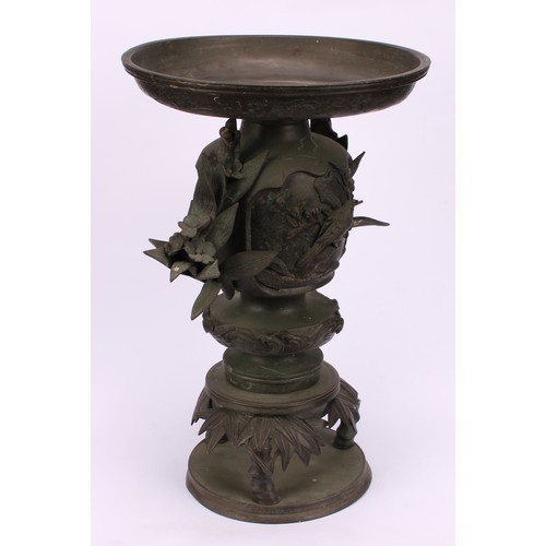 255 - A pair of Japanese bronze usebata or ikebana vases, each cast with birds amongst flora, leafy bamboo... 