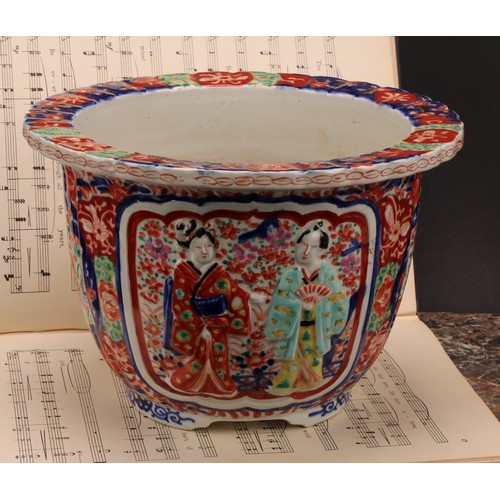 235 - A Japanese porcelain fluted jardiniere, moulded with figures and painted in the Imari palette, 19cm ... 