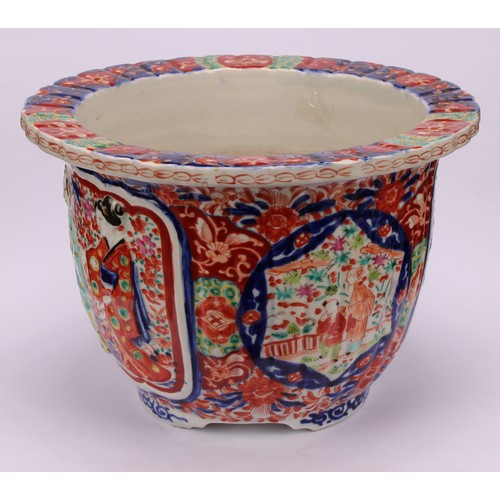 235 - A Japanese porcelain fluted jardiniere, moulded with figures and painted in the Imari palette, 19cm ... 