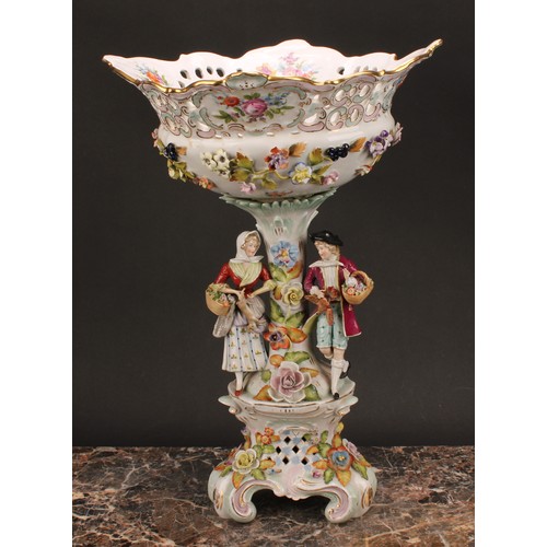 158 - A Sitzendorf porcelain figural table centre, moulded, decorated and applied with a courting couple a... 