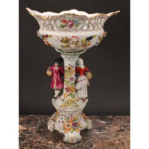 158 - A Sitzendorf porcelain figural table centre, moulded, decorated and applied with a courting couple a... 