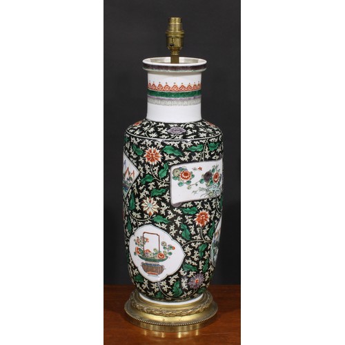 223 - A Chinese rouleau vase, painted in the famille verte palette on a noir ground, later fitted as a lam... 