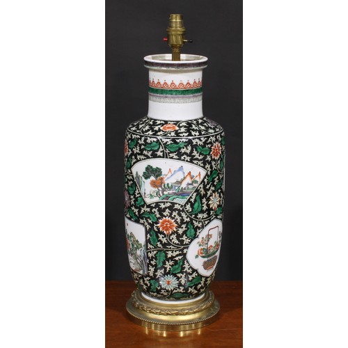 223 - A Chinese rouleau vase, painted in the famille verte palette on a noir ground, later fitted as a lam... 