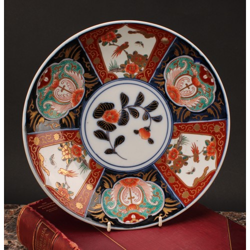 230 - A Japanese circular dish, decorated in the Imari palette, 31cm diameter, Meiji period