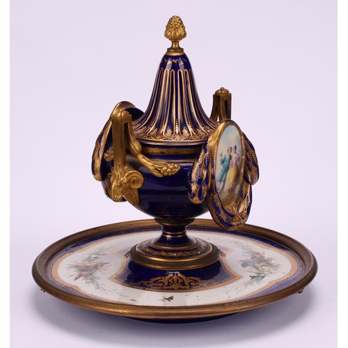 127 - A 19th century Continental gilt metal mounted porcelain inkwell, in the manner of Sèvres, decorated ... 