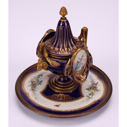 127 - A 19th century Continental gilt metal mounted porcelain inkwell, in the manner of Sèvres, decorated ... 