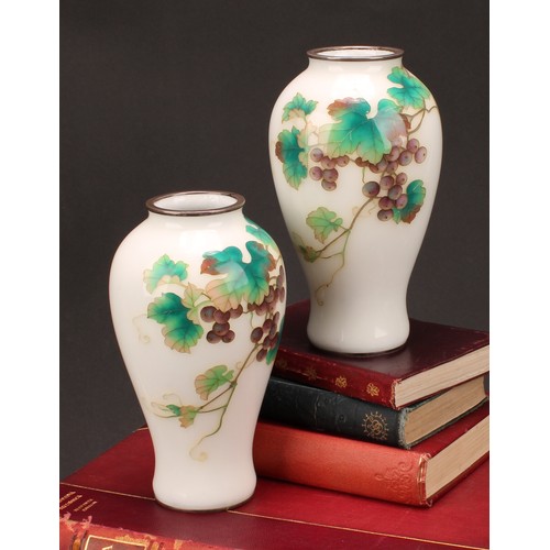 256 - A pair of Japanese cloisonné ovoid vases, decorated with fruiting vine on an opaque ground, silver c... 