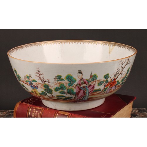 274 - An 18th century Chinese porcelain punch bowl, painted in polychrome with figures of the court and at... 