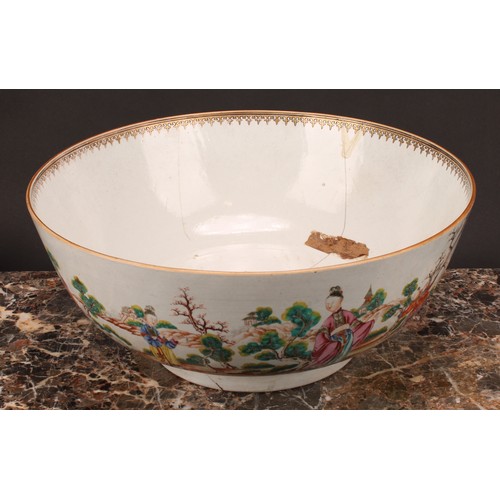 274 - An 18th century Chinese porcelain punch bowl, painted in polychrome with figures of the court and at... 