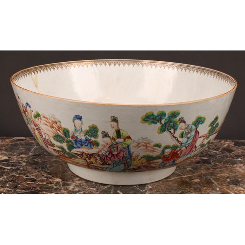 274 - An 18th century Chinese porcelain punch bowl, painted in polychrome with figures of the court and at... 