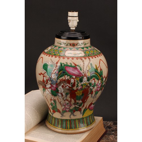 205 - A Chinese crackle glazed baluster vase, painted in polychrome enamels with warriors, four character ... 