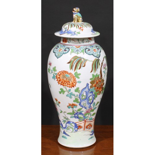 262 - A large 19th century famille rose ovoid vase and cover, painted in in polychrome enamels with flower... 