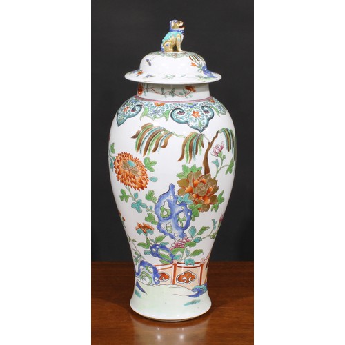 262 - A large 19th century famille rose ovoid vase and cover, painted in in polychrome enamels with flower... 