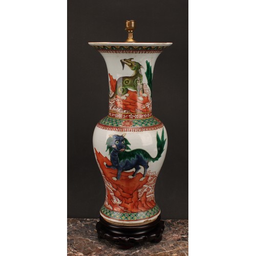 199 - A Chinese baluster vase, painted in polychrome with chimera, fitted as a lamp, hardwood base, 52cm h... 