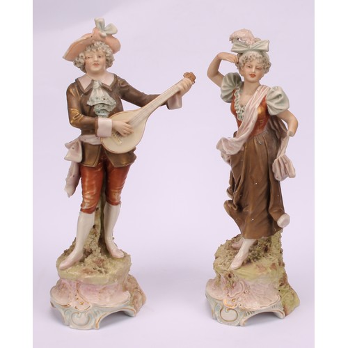 148 - A pair of Royal Dux figures, musician and dancer, impressed 338 and 339, applied pink triangle marks... 