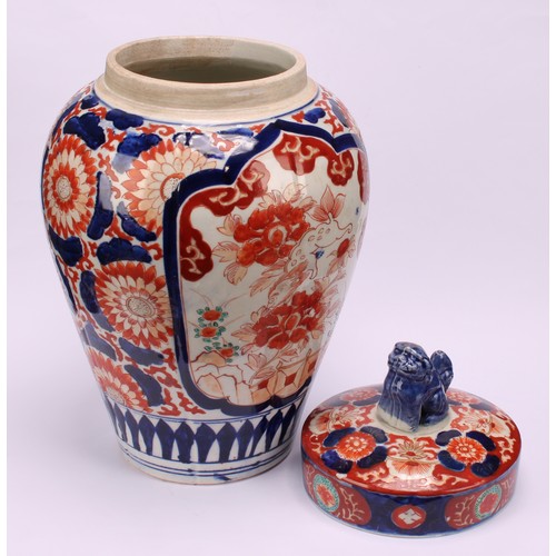 268 - A pair of Japanese ovoid jars and covers, decorated in the Imari palette, 32cm high, Meiji period