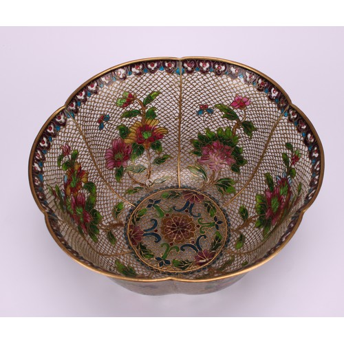 246 - A Chinese plique-à-jour enamel lobed circular bowl, decorated with flowers beneath a lappet border, ... 