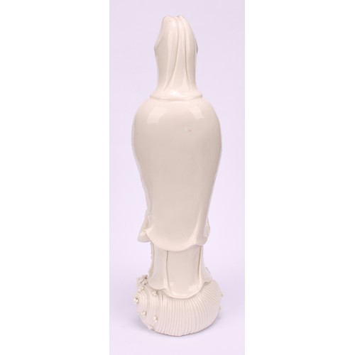 201 - A Chinese blanc de chine figure, Guanyin, 33cm high