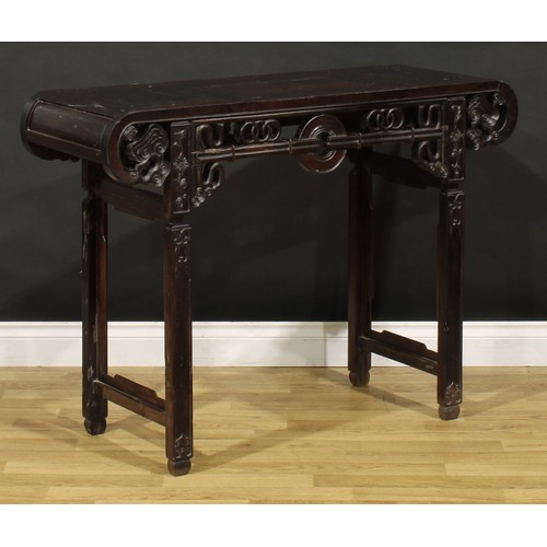 1227 - A Chinese hardwood altar table, rectangular top with scroll ends terminating in stylised clouds, the... 