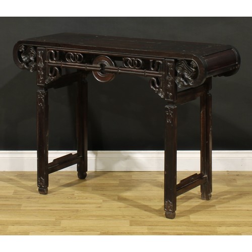 1227 - A Chinese hardwood altar table, rectangular top with scroll ends terminating in stylised clouds, the... 