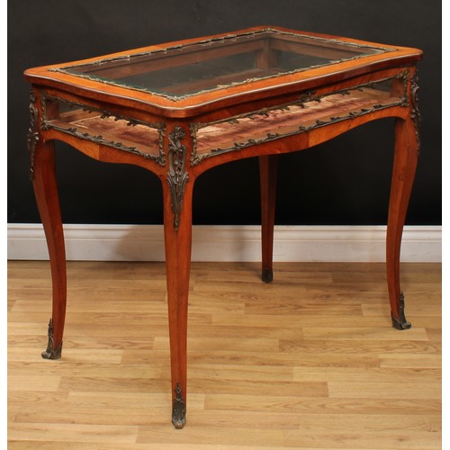 1385 - A 19th century gilt metal mounted rosewood serpentine bijouterie table, in the Louis XV taste, hinge... 