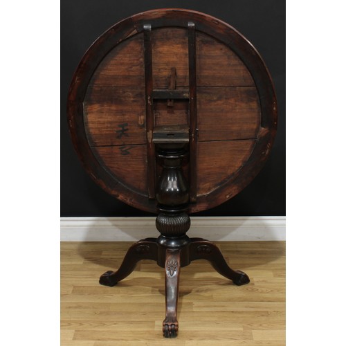 1399 - A Chinese hardwood tripod centre table, circular top with inset dreamstone panel and inlaid in mothe... 