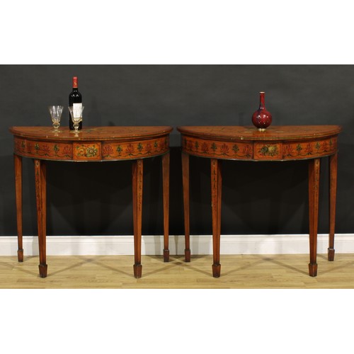 1281 - A pair of Sheraton Revival satinwood and painted demilune pier tables, each top painted in polychrom... 