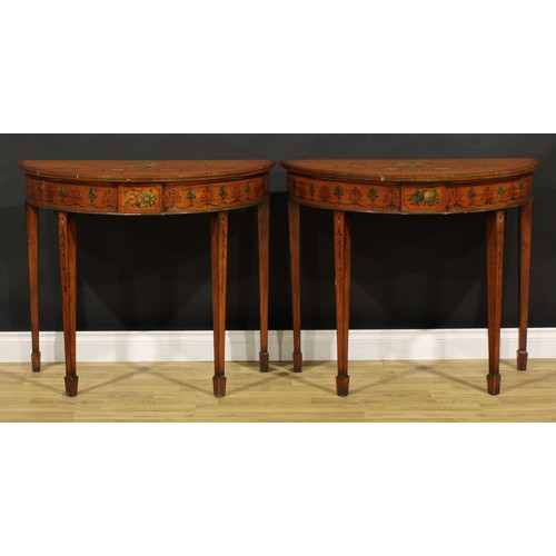 1281 - A pair of Sheraton Revival satinwood and painted demilune pier tables, each top painted in polychrom... 