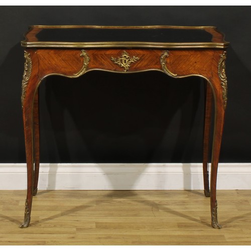 1417 - A Louis XV Revival gilt metal mounted kingwood bureau plat or writing table, of small proportions, s... 