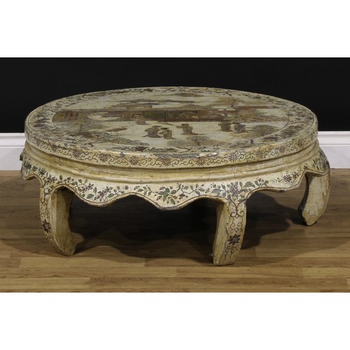 1224 - A Chinese export low table, circular top decorated with figures in a pagoda landscape on an off-whit... 