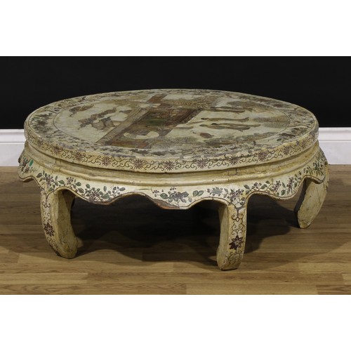 1224 - A Chinese export low table, circular top decorated with figures in a pagoda landscape on an off-whit... 